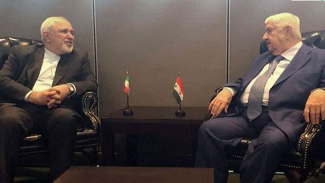گفت‌و‌گوی ظریف با ولید معلم و تأکید بر ادامه روابط ایران و سوریه